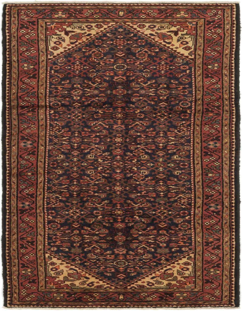 A 10 ft Hossainabad runner rug featuring a traditional Persian pattern in deep blues and reds, ideal for a hallway.