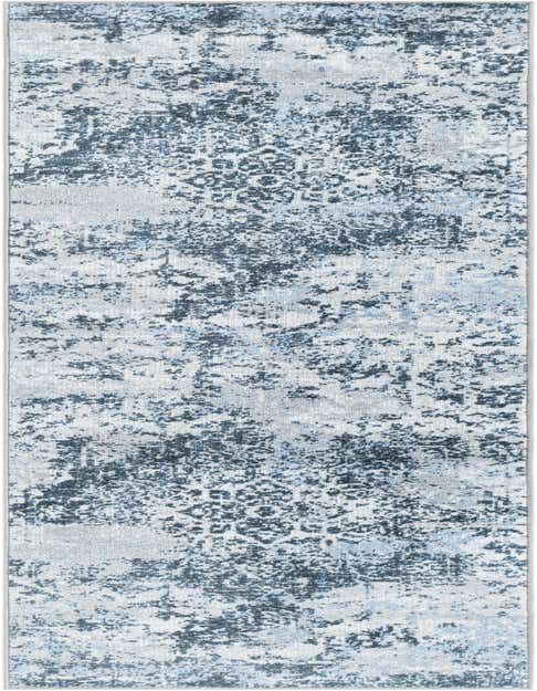 An 8 ft runner rug in shades of blue and white with a distressed traditional medallion pattern, ideal for a hallway.