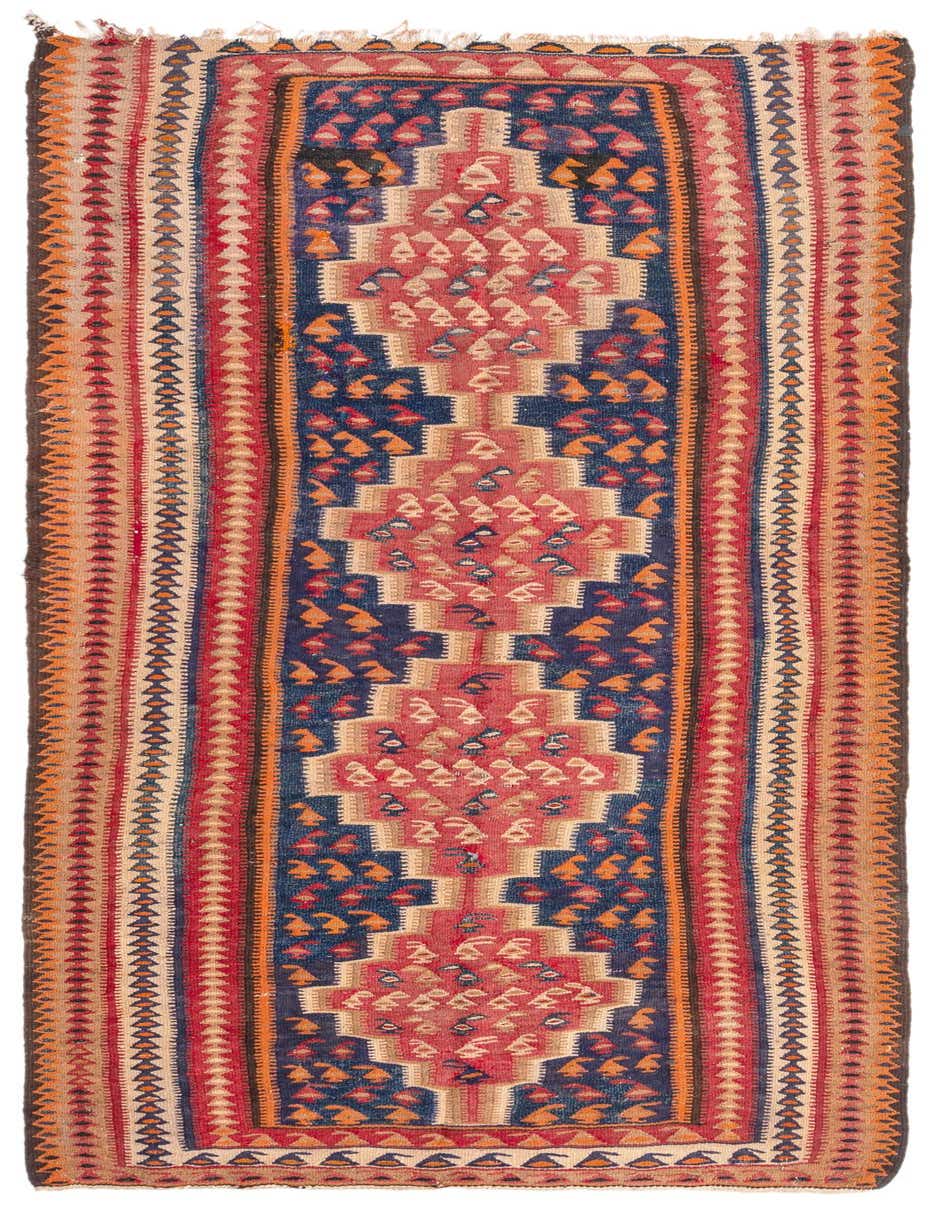 A 9 ft runner rug with a tribal Persian pattern in navy blue, red, orange, and beige, ideal for a hallway.