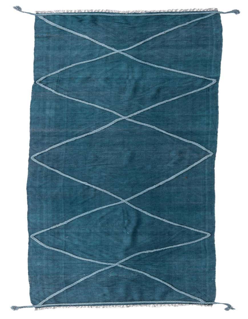 A 10 ft runner rug in deep teal blue, featuring a light blue geometric diamond pattern and braided tassels.