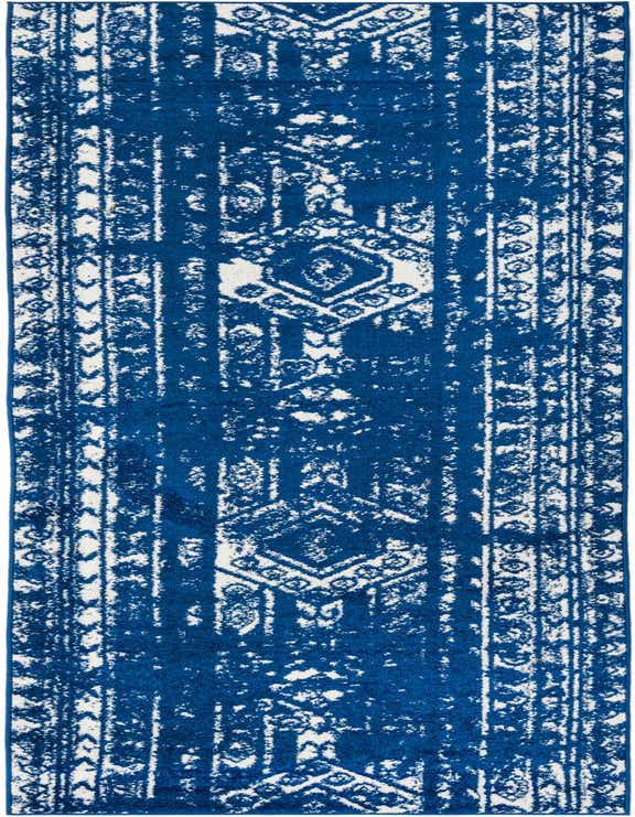 A 12 ft blue and white runner rug featuring a distressed Southwestern tribal pattern, perfect for a hallway.