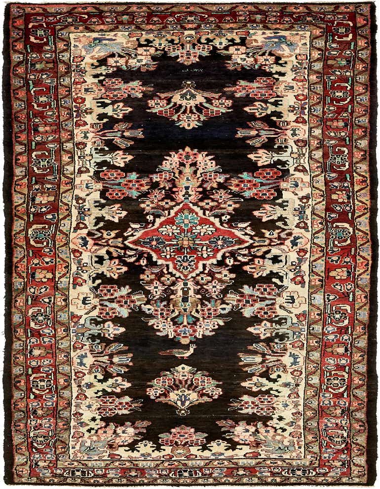 A 10 ft runner rug with a navy blue field, featuring a traditional Persian medallion and botanical patterns in red, blue, and cream, ideal for a hallway.