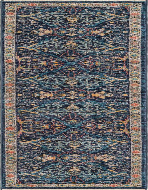 A long 8 ft runner rug with a distressed traditional tribal pattern in shades of navy blue, teal, and gold, with hints of coral.