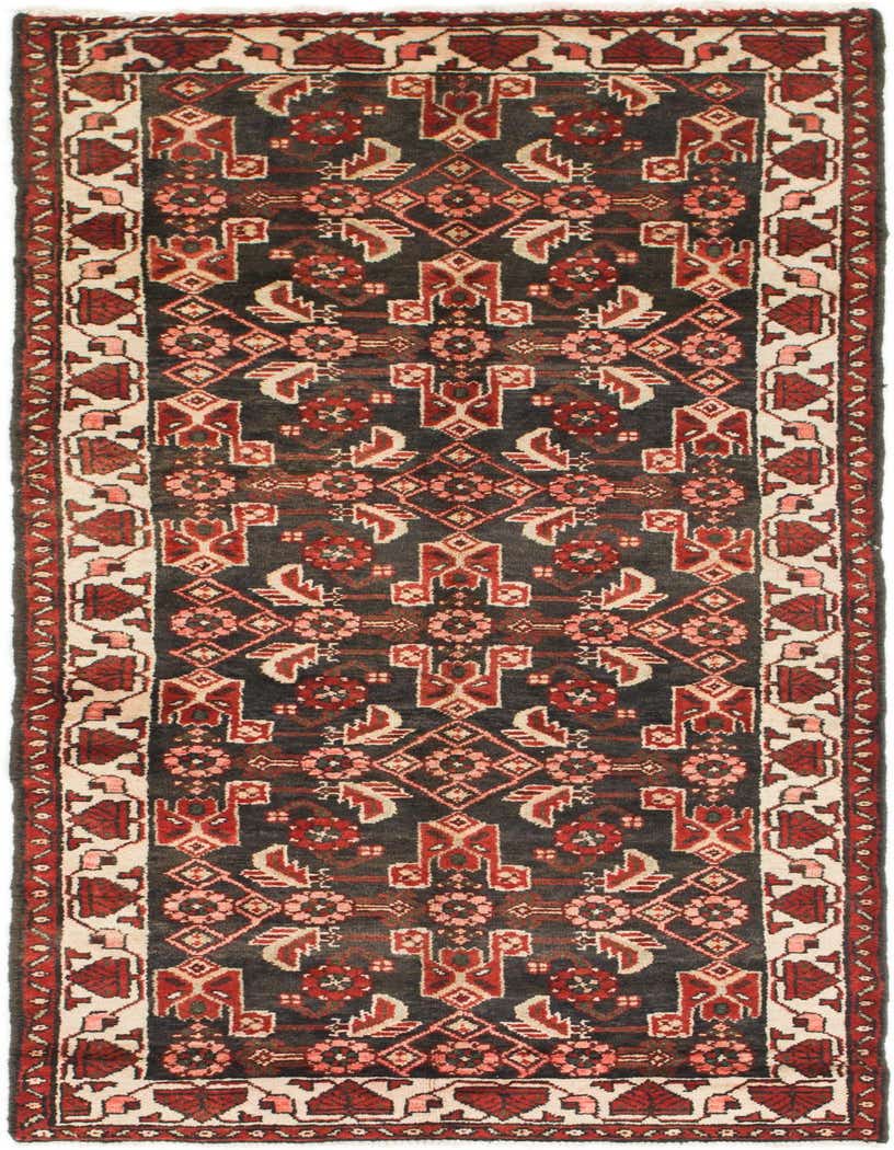 A 10 ft runner rug from the Malayer collection, featuring a traditional tribal Persian pattern in navy blue, red, and cream.