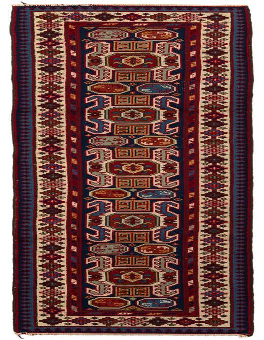 A long 11 ft runner rug featuring a traditional tribal pattern in various shades of blue, red, and cream.