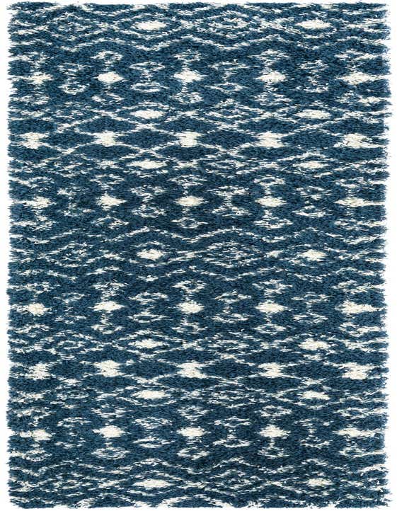 A 10 ft runner rug featuring a plush navy blue shag pile with a white modern tribal trellis pattern, ideal for a hallway.