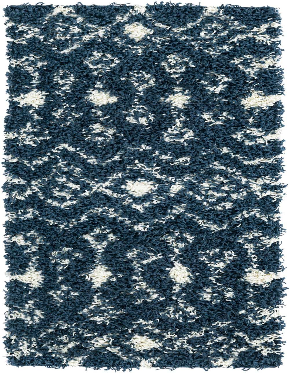 A 4 ft runner rug from the Moroccan Trellis Shag collection, featuring a navy blue and white tribal pattern with a plush shag pile.
