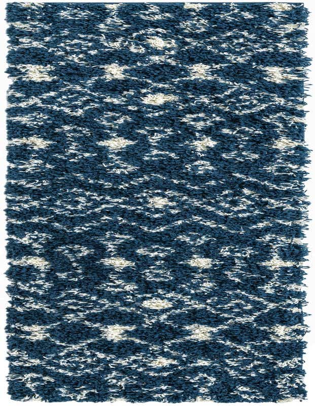 A 7 ft runner rug featuring a navy blue and off-white tribal trellis pattern with a plush shag pile, perfect for a hallway.