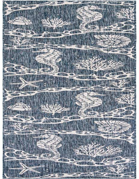 A 12 ft navy blue runner rug with a white coastal pattern featuring seahorses, starfish, shells, and coral.