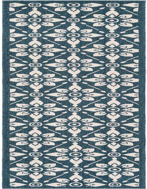 A navy blue and cream 8 ft runner rug with a repeating modern floral lattice pattern, suitable for a hallway or patio.