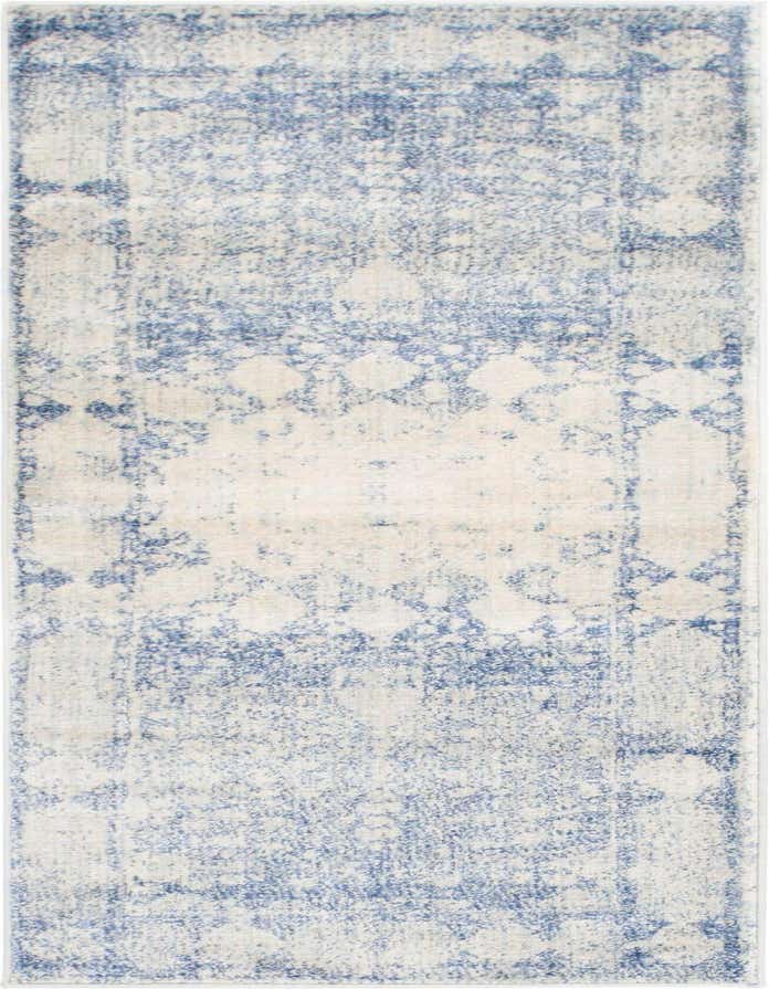 A 6 ft runner rug with a faded Bohemian medallion pattern in varying shades of blue and cream, ideal for a hallway or kitchen.