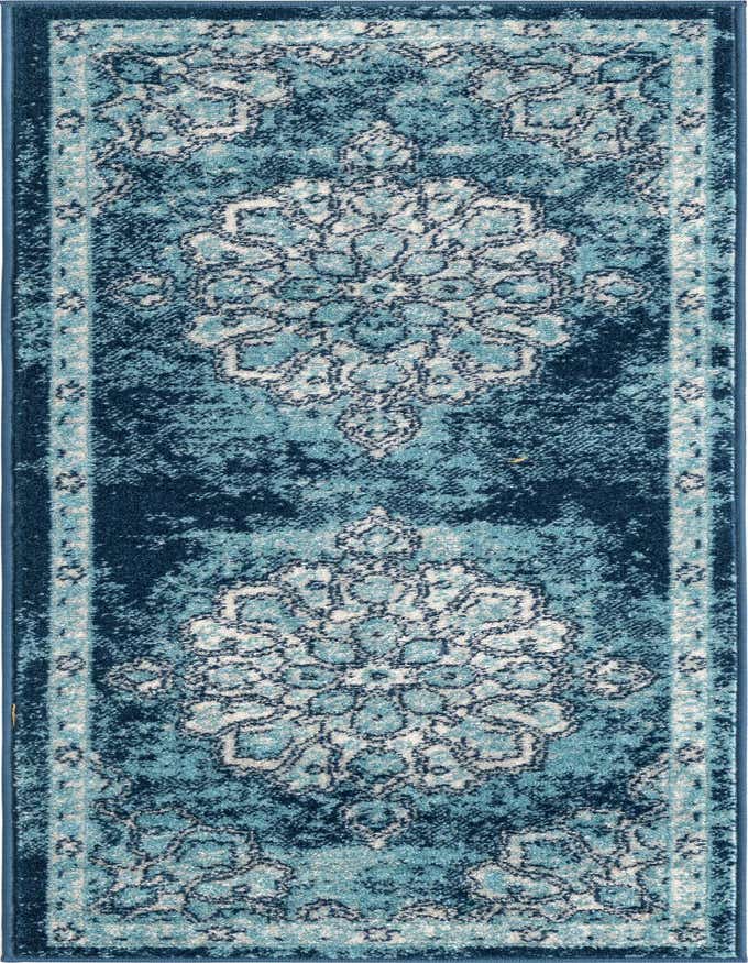 A 6 ft runner rug featuring a distressed traditional medallion pattern in varying shades of blue, ideal for a hallway or kitchen.