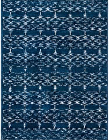 A long 16 ft runner rug in deep navy blue with a distressed white tribal trellis pattern, ideal for a hallway.