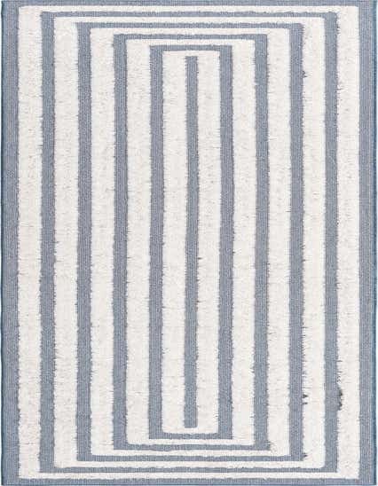 A 12 ft runner rug featuring a modern striped pattern in varying shades of blue and white, with a textured, high pile.