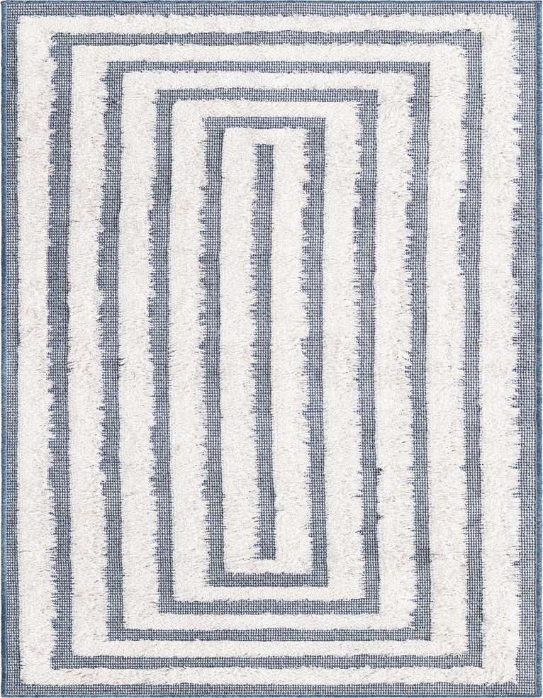 A 6 ft runner rug featuring a modern stripe pattern in varying shades of blue and white, with a textured, high pile.