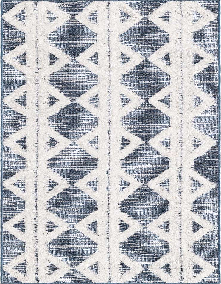 A 6 ft runner rug featuring a modern tribal pattern of thick, textured white diamonds on a flatweave navy blue background, ideal for a hallway.