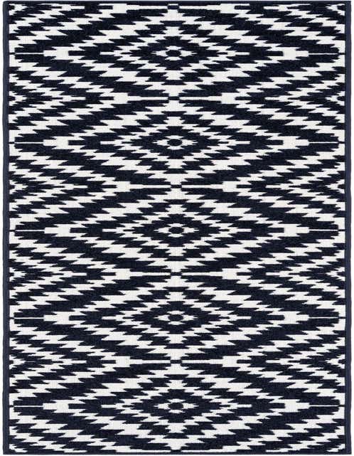 A navy blue and white modern geometric runner rug with a repeating diamond pattern, ideal for hallways or patios.