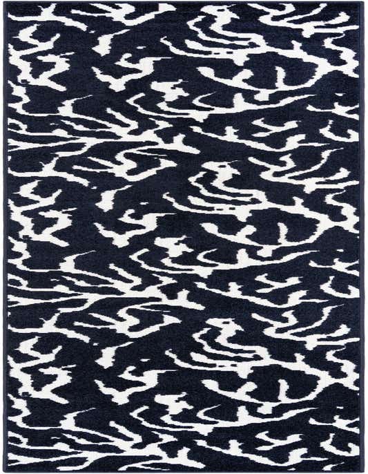 A 10 ft runner rug featuring a modern abstract pattern of white organic shapes on a dark navy blue background.