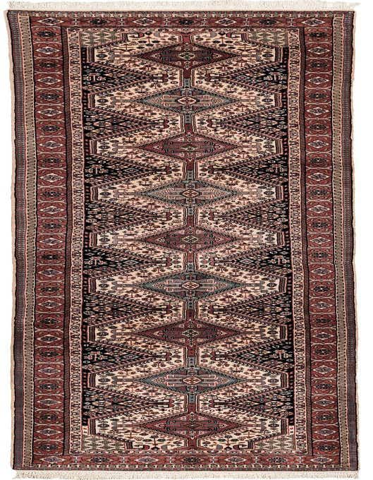 A long 11 ft runner rug with a tribal and traditional pattern in blues, creams, and reds, ideal for a hallway.