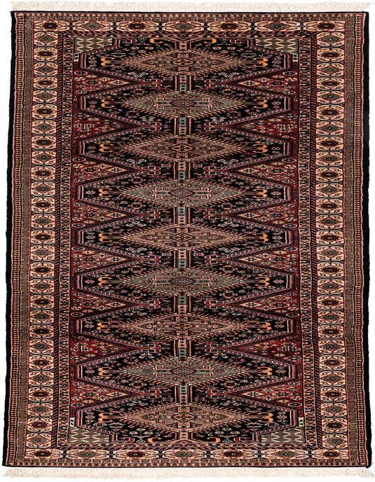 A handmade 11 ft runner rug with a tribal pattern in blues, reds, and creams, ideal for a hallway.