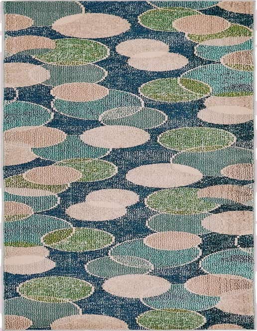 A 10 ft runner rug with a navy blue background and an abstract pattern of overlapping circles in shades of teal, green, and beige.