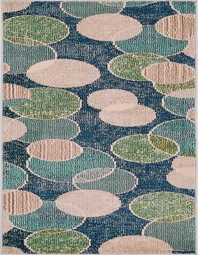 A 7 ft runner rug featuring an abstract pattern of overlapping circles in shades of blue, green, and beige on a navy background.