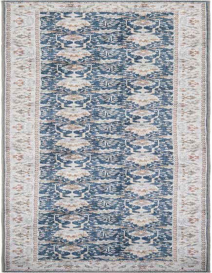 A 12 ft navy blue runner rug with a distressed traditional medallion pattern and a light beige border, ideal for a hallway.