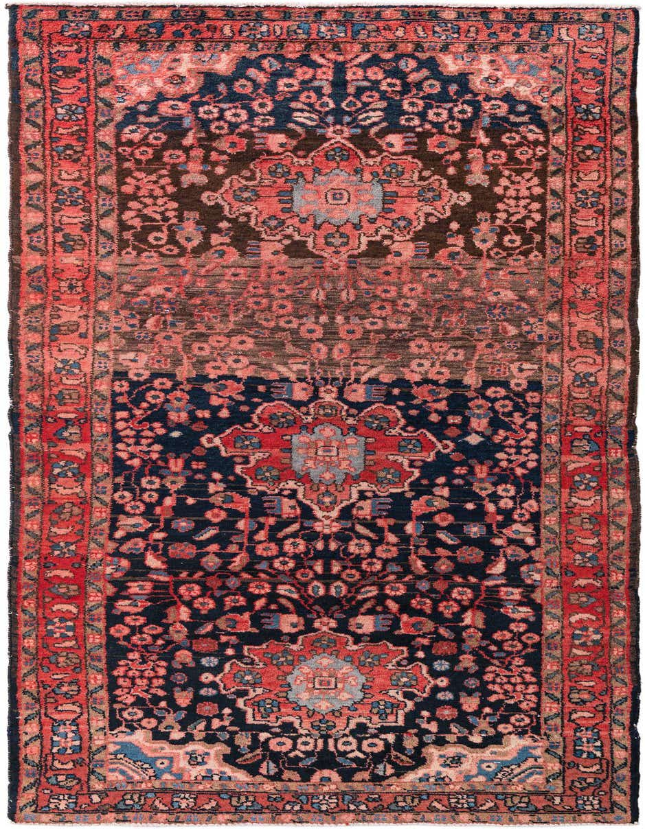 A 9 ft runner rug featuring a navy blue and dark brown field with intricate red, pink, and light blue Persian medallion and floral patterns, framed by a red border.