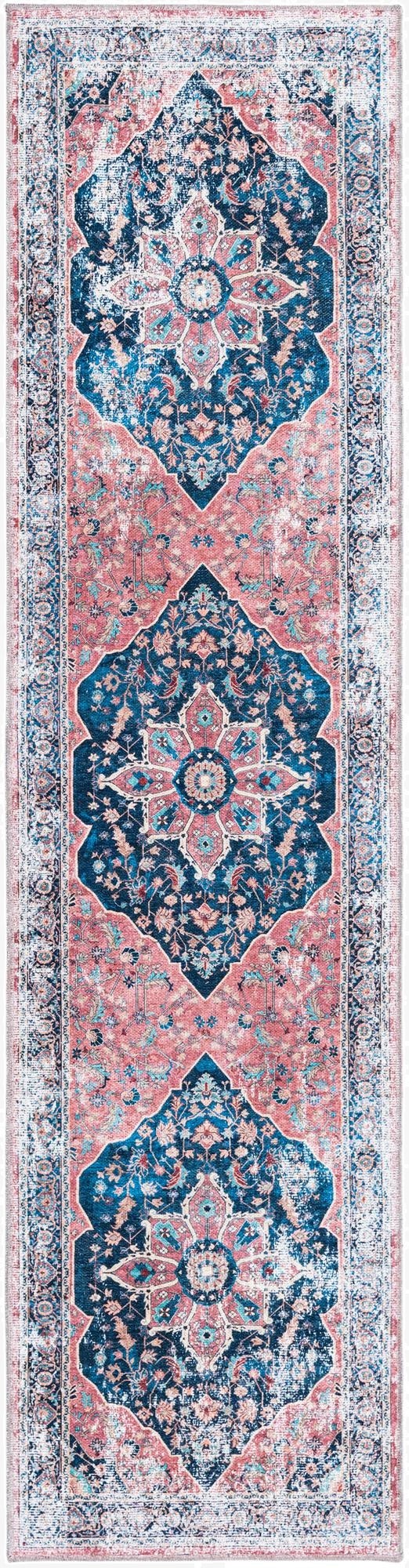 A distressed 8 ft runner rug with a traditional medallion pattern in shades of navy blue, light blue, and faded pink, ideal for a hallway or kitchen.