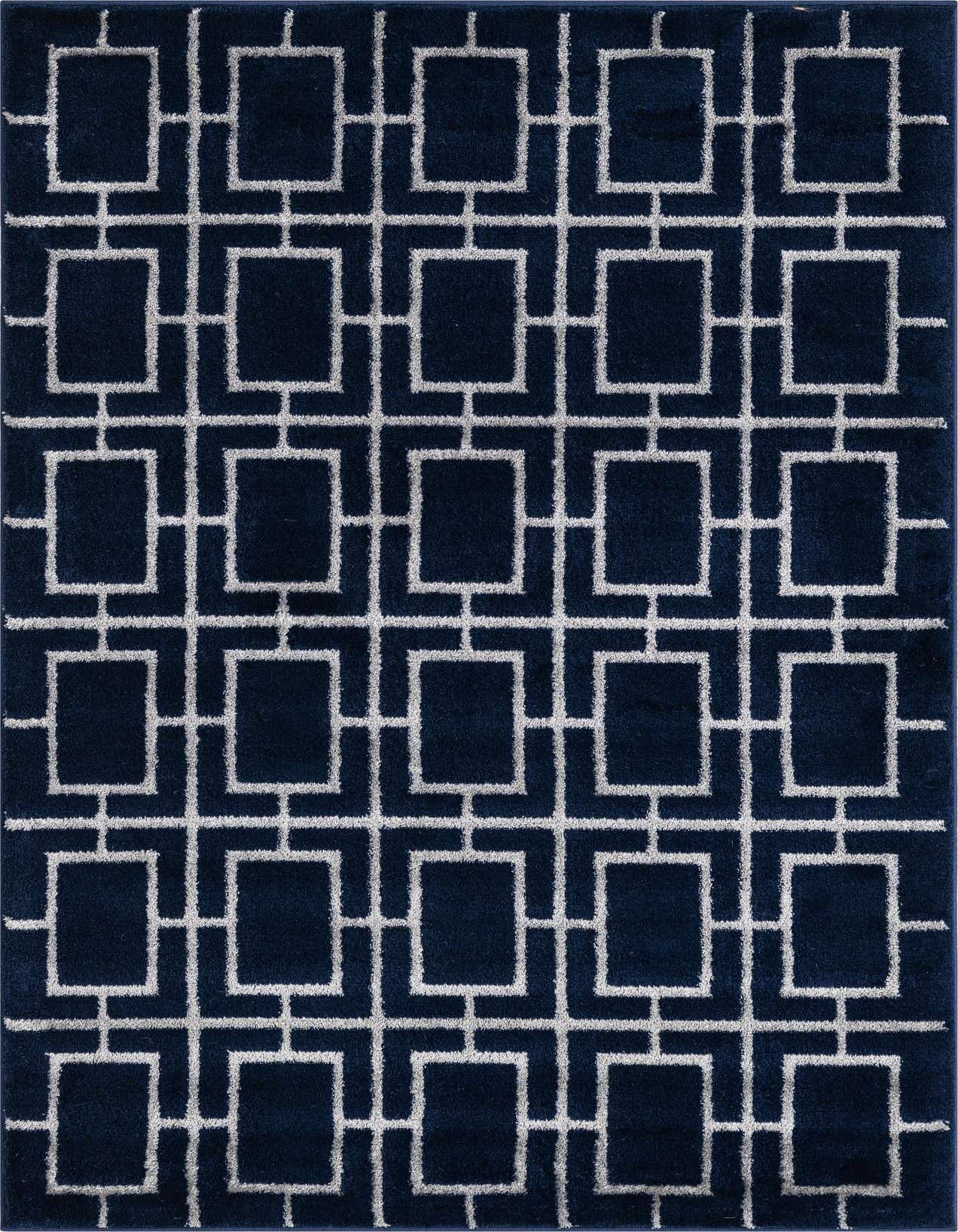 A 3x5 rectangular navy blue area rug with a repeating white geometric trellis pattern, featuring interconnected squares.