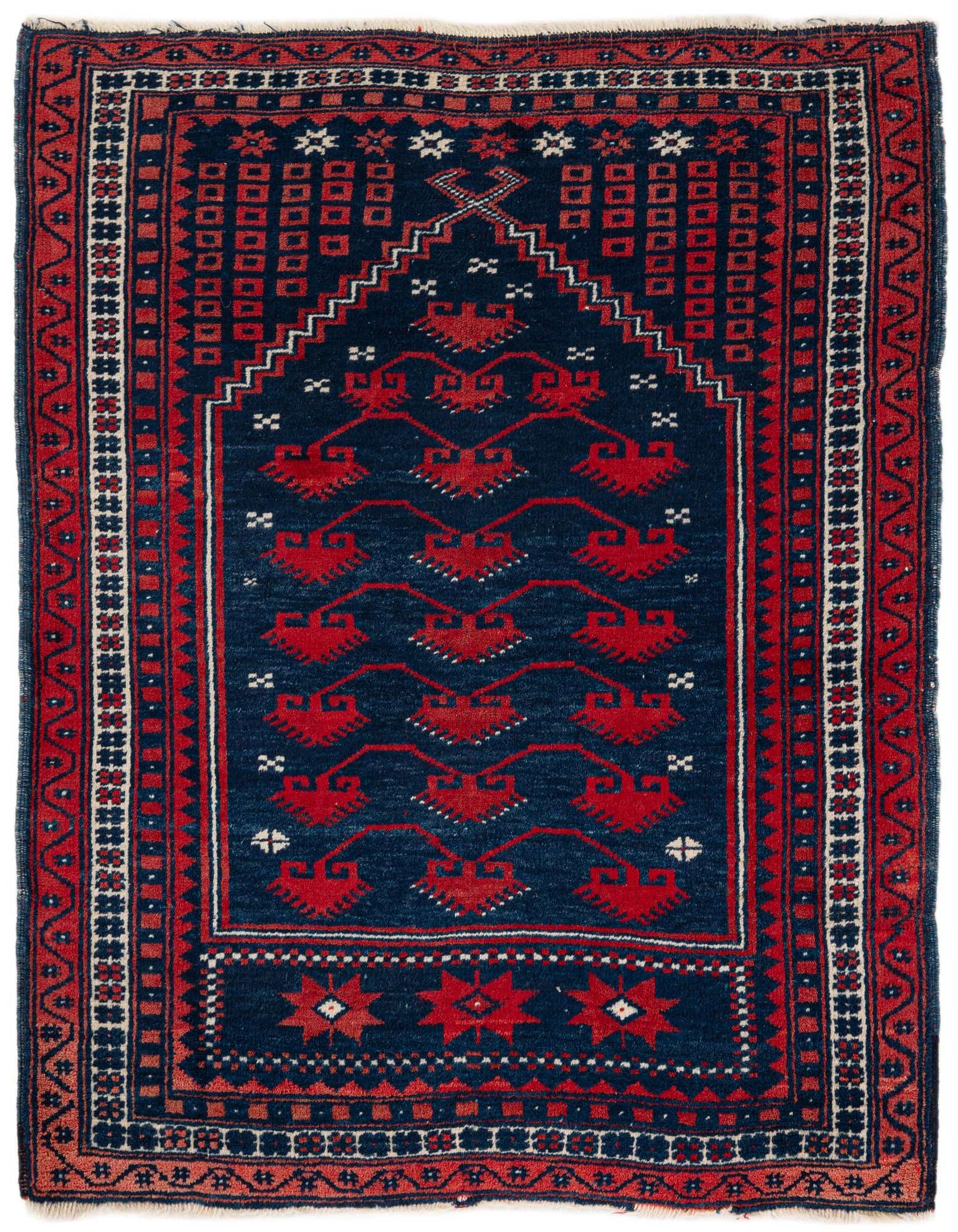A 2' 8 x 3' 3 square Balouch rug with a deep navy blue field and intricate red, white, and light blue traditional tribal patterns.