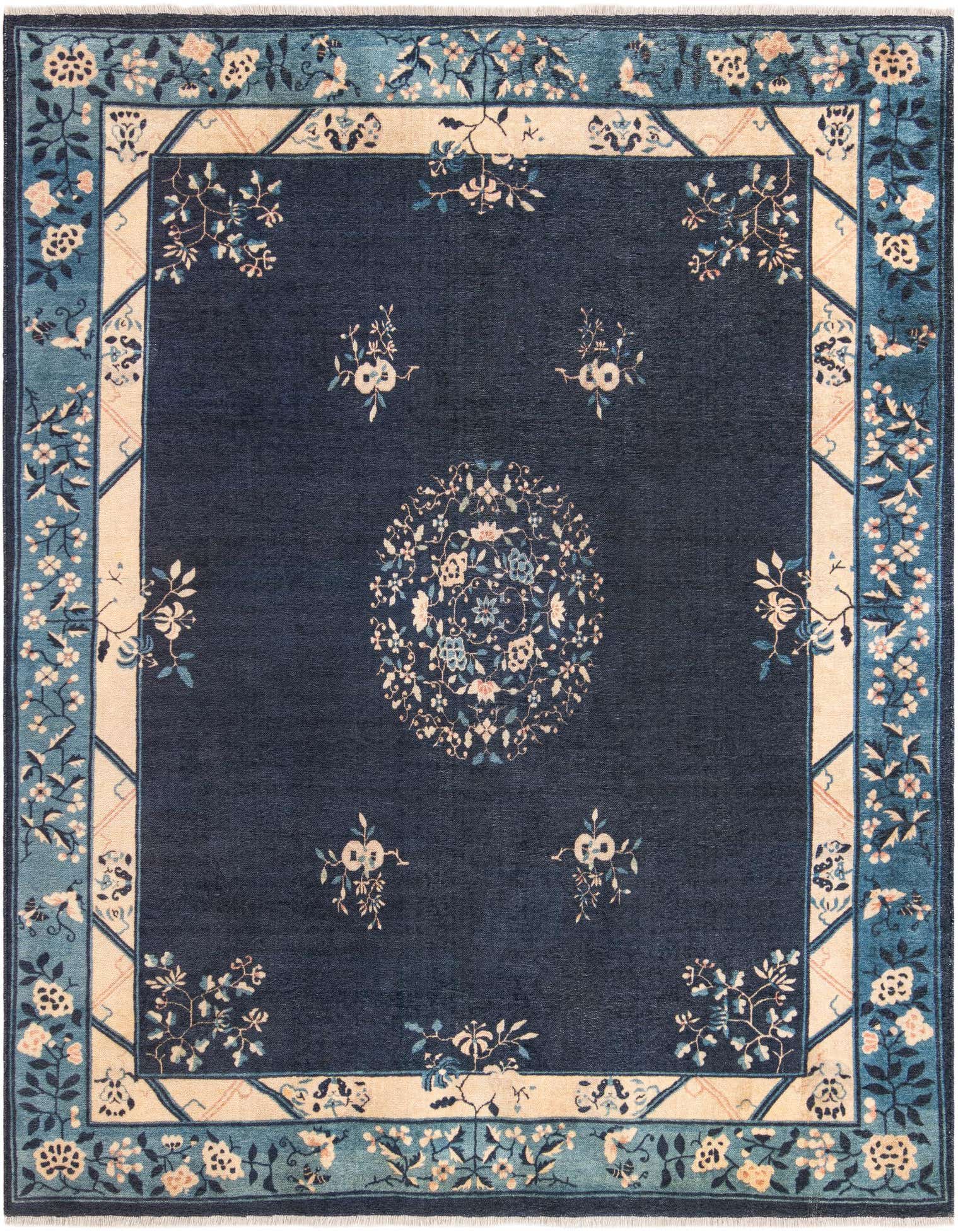 A square navy blue rug with a central floral medallion and scattered floral motifs, framed by a light beige and teal border with intricate botanical patterns.