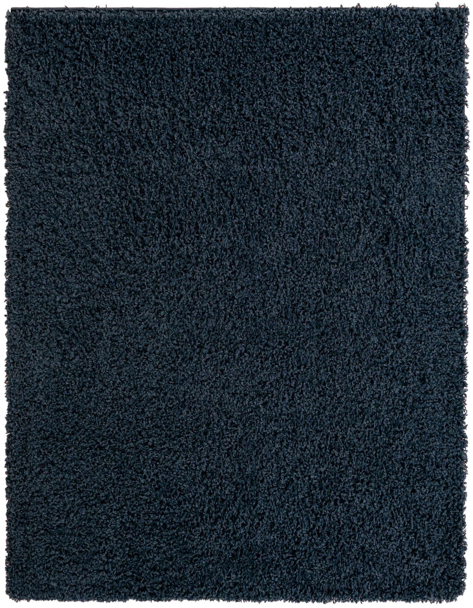 A soft, plush 5' x 5' navy blue shag rug, perfect for adding cozy texture to any indoor space.
