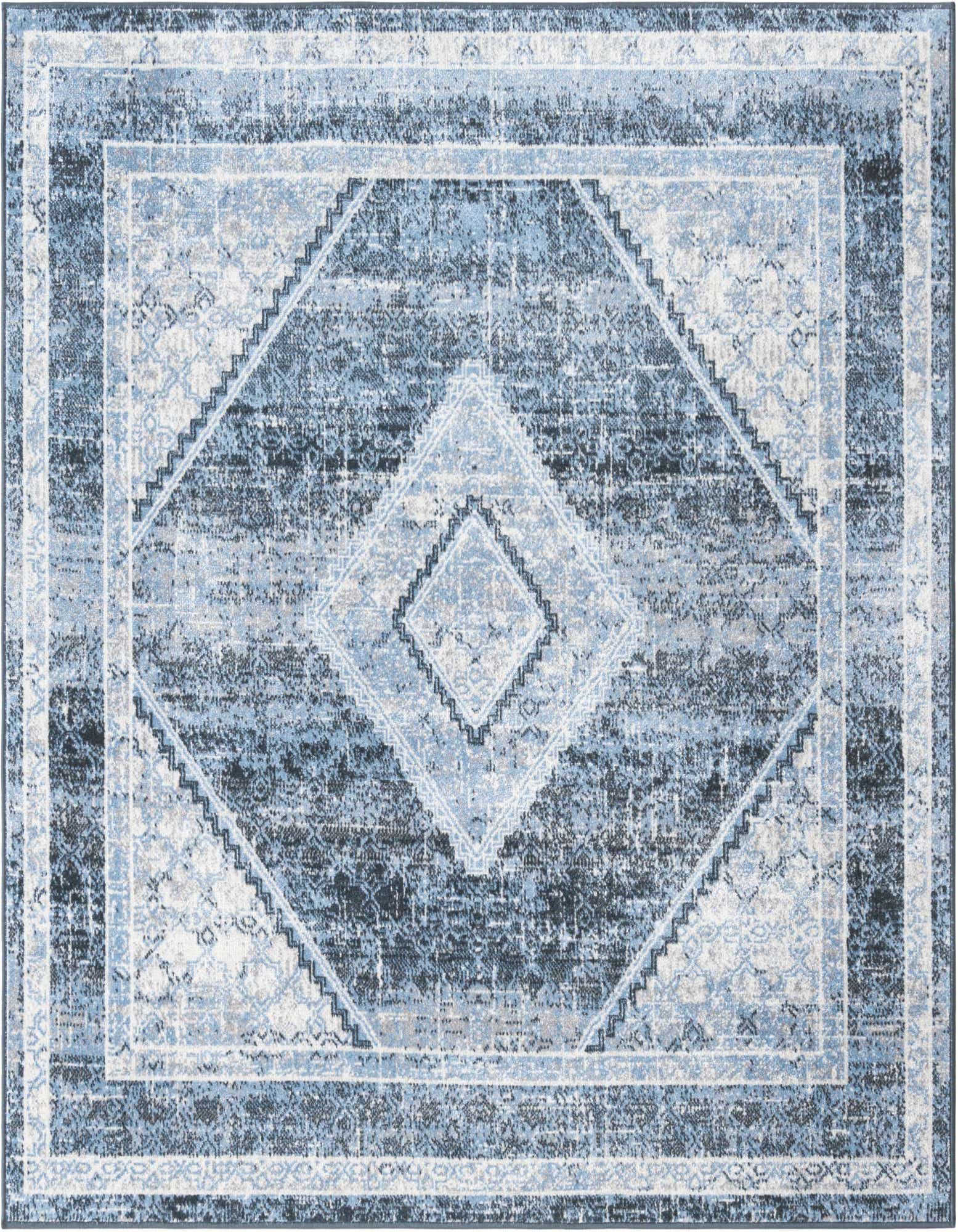 A 5' 3 x 5' 3 square Kamala Washable rug featuring a distressed navy blue and light blue traditional medallion pattern.
