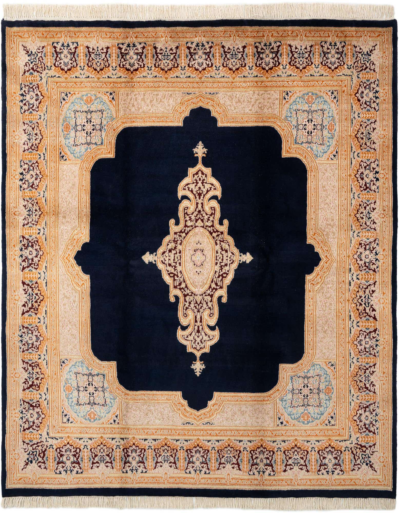 A square navy blue Kerman rug with a traditional medallion pattern and intricate light beige, red, and light blue borders.