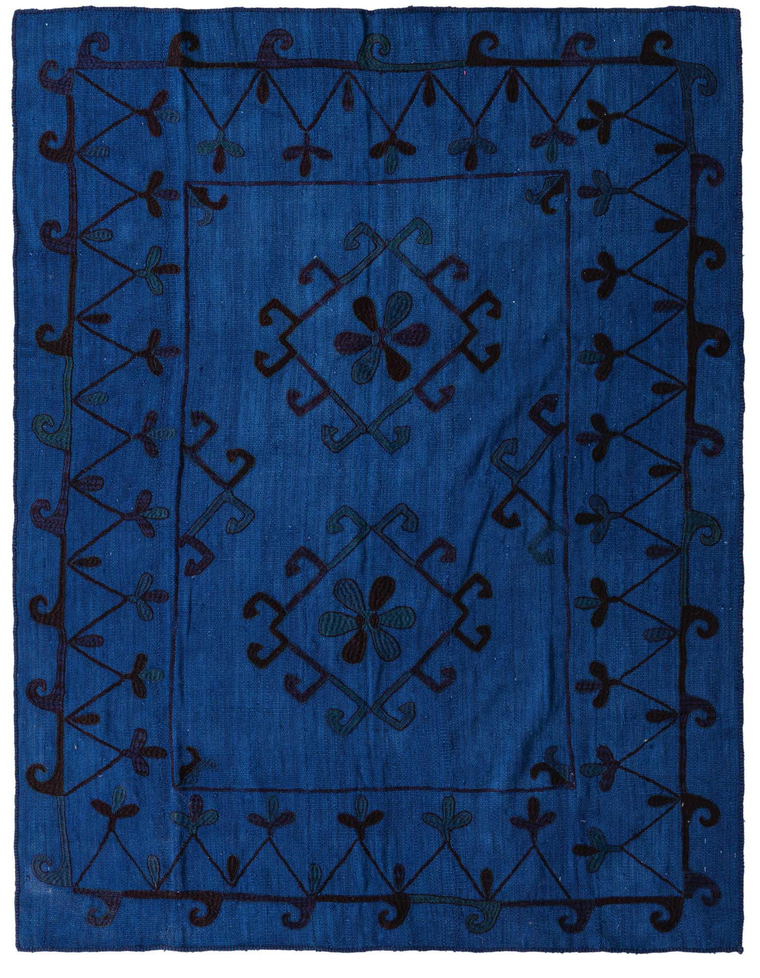 A 6' 0 x 7' 4 square navy blue flatweave wool rug with a tribal, abstract pattern in darker blue and green tones.