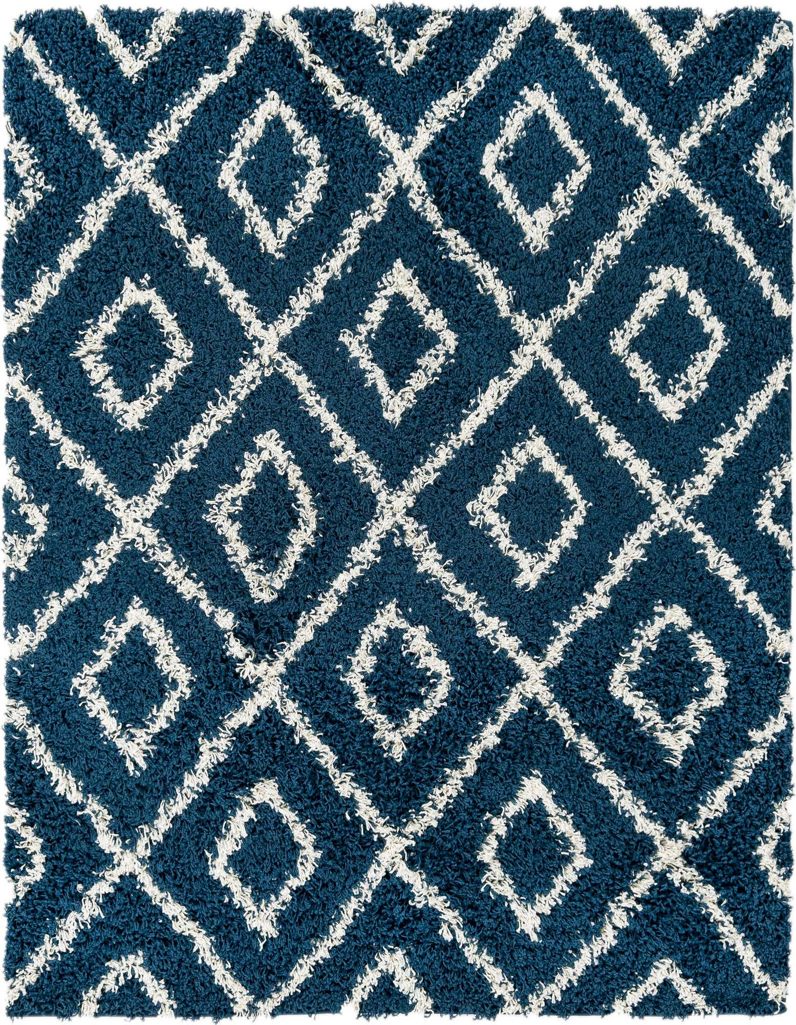 A 5' 3 x 5' 3 square navy blue shag rug with a white modern lattice pattern, showcasing its high/low textured pile.