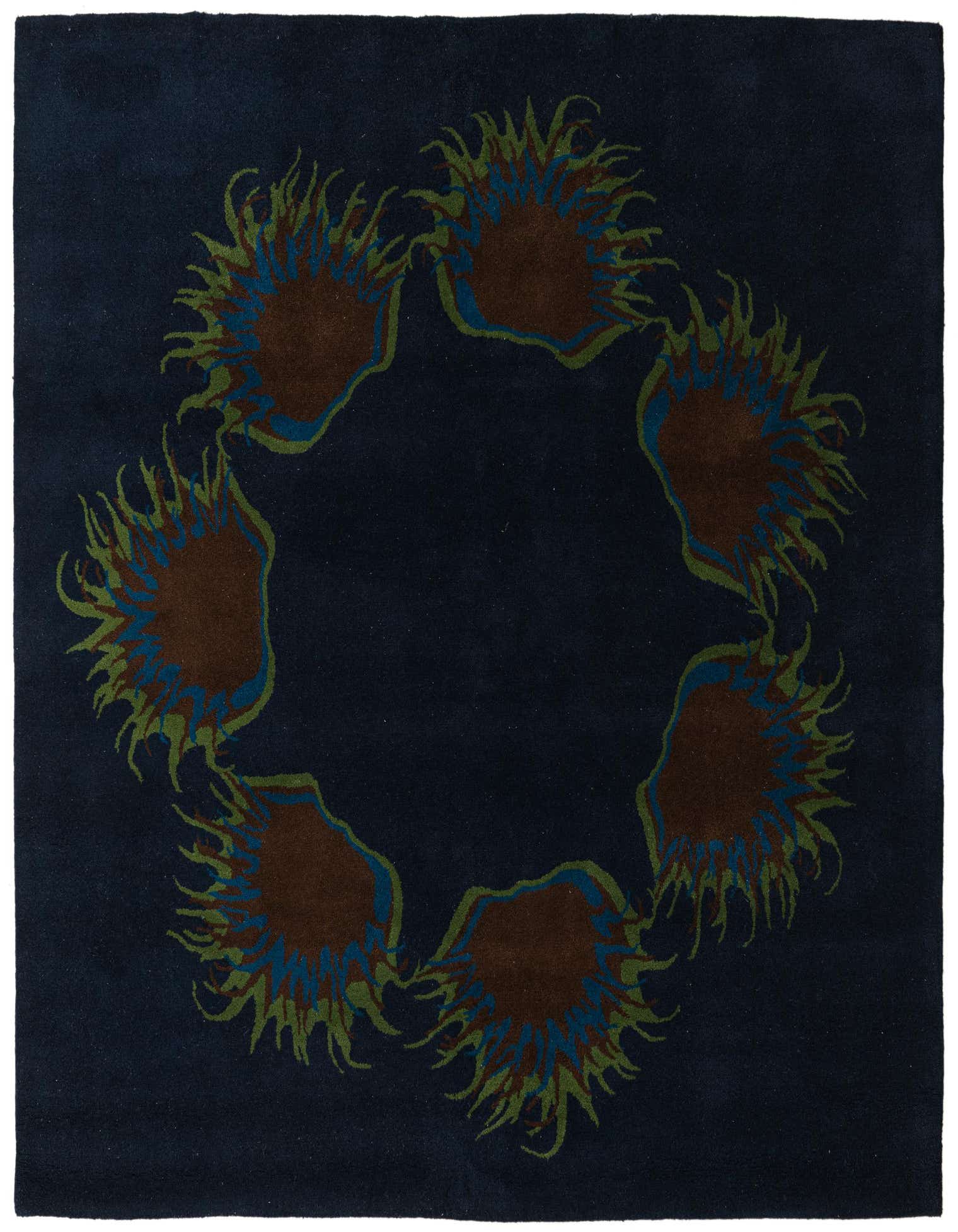 A square navy blue rug with a circular modern floral pattern in brown, green, and blue, perfect for an indoor living space.