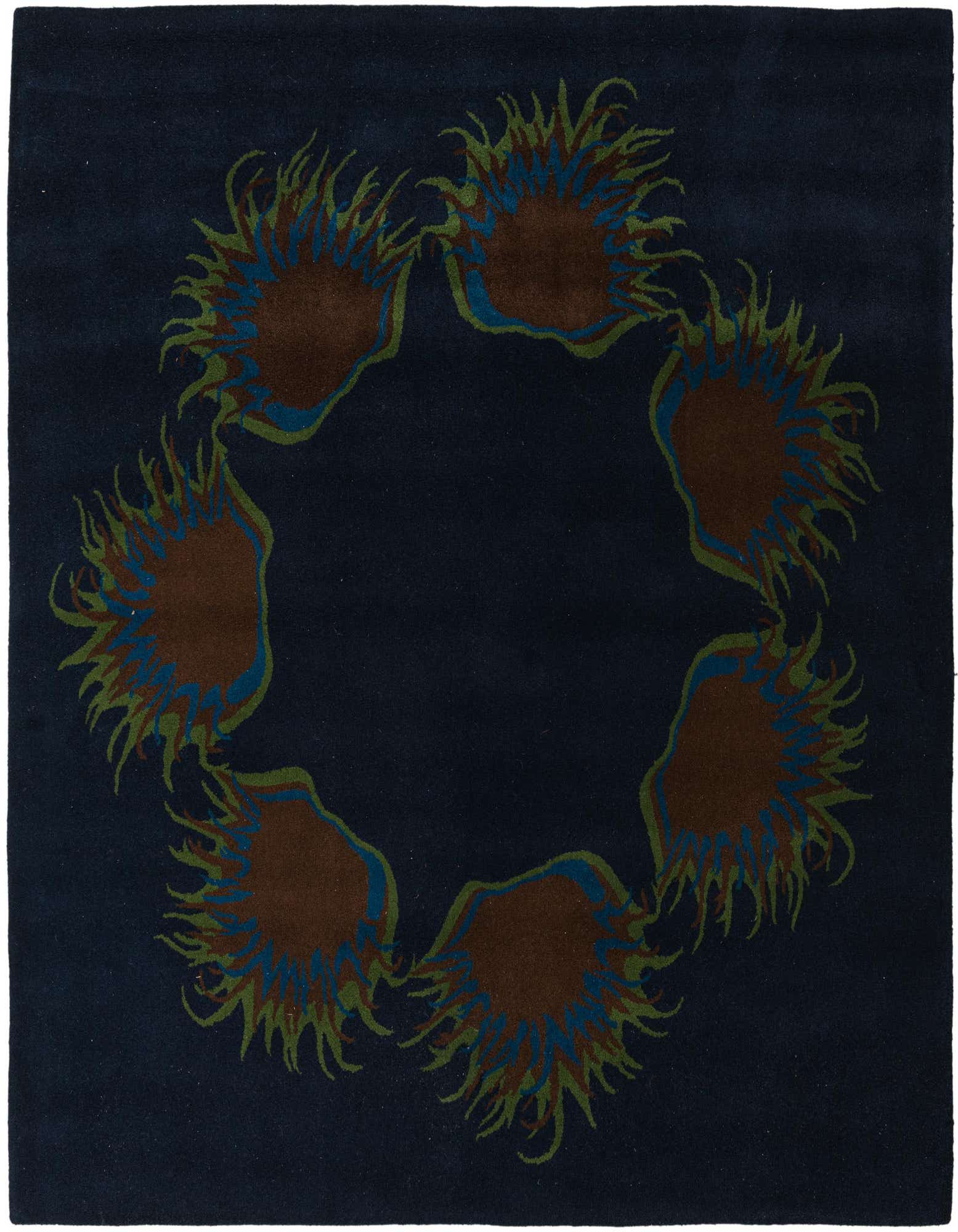 A square navy blue rug with a circular modern pattern of brown, blue, and green abstract shapes resembling sea anemones.