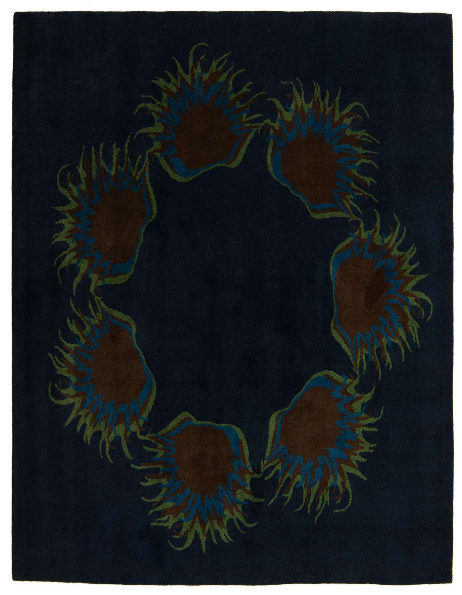 A 7' 7 x 7' 7 square navy blue modern floral rug with a high pile, handmade from wool and cotton.