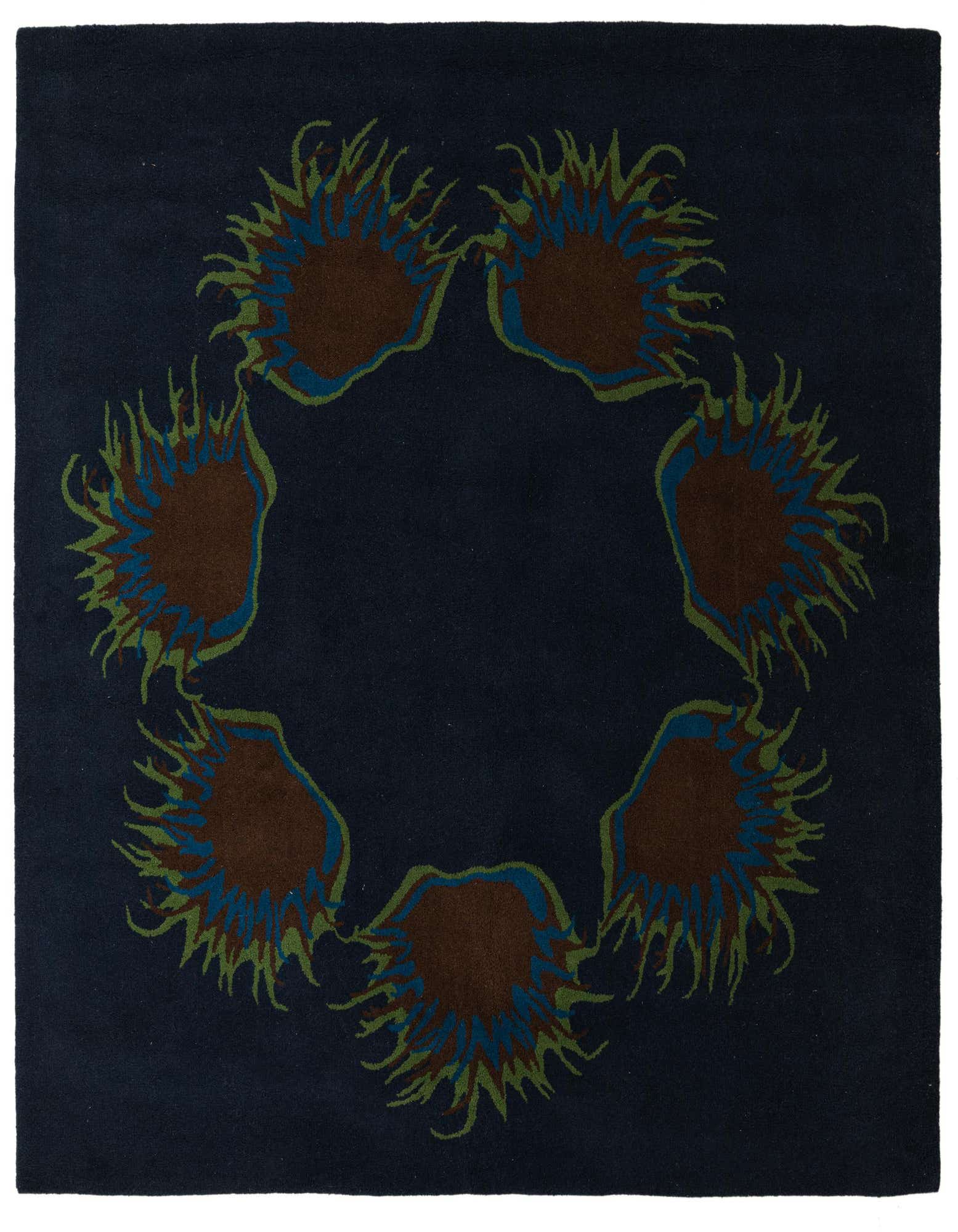 A 7' 5 x 7' 5 square navy blue rug with a circular modern floral pattern in brown, blue, and green.