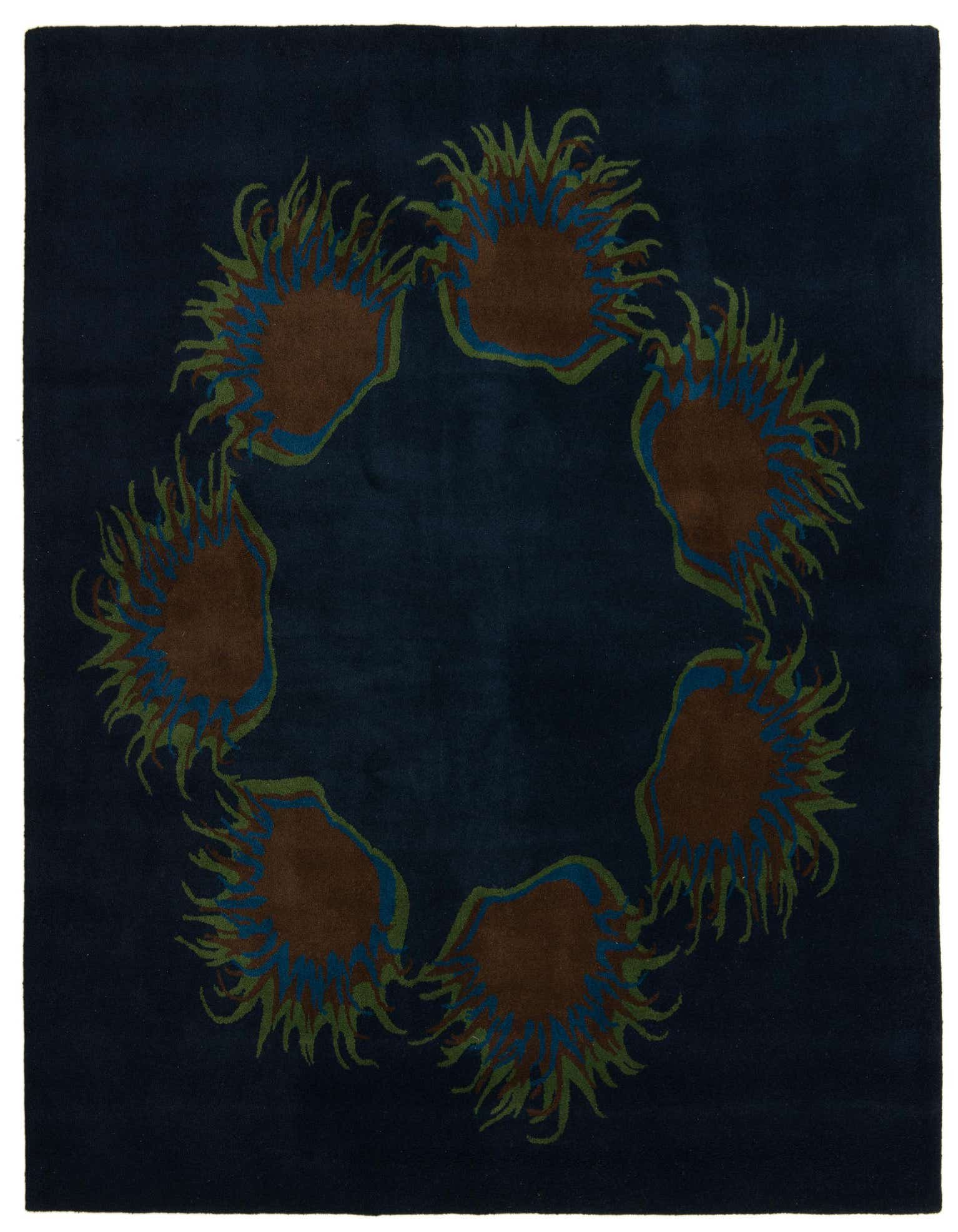 A square navy blue rug featuring a circular modern floral pattern with brown, blue, and green accents.
