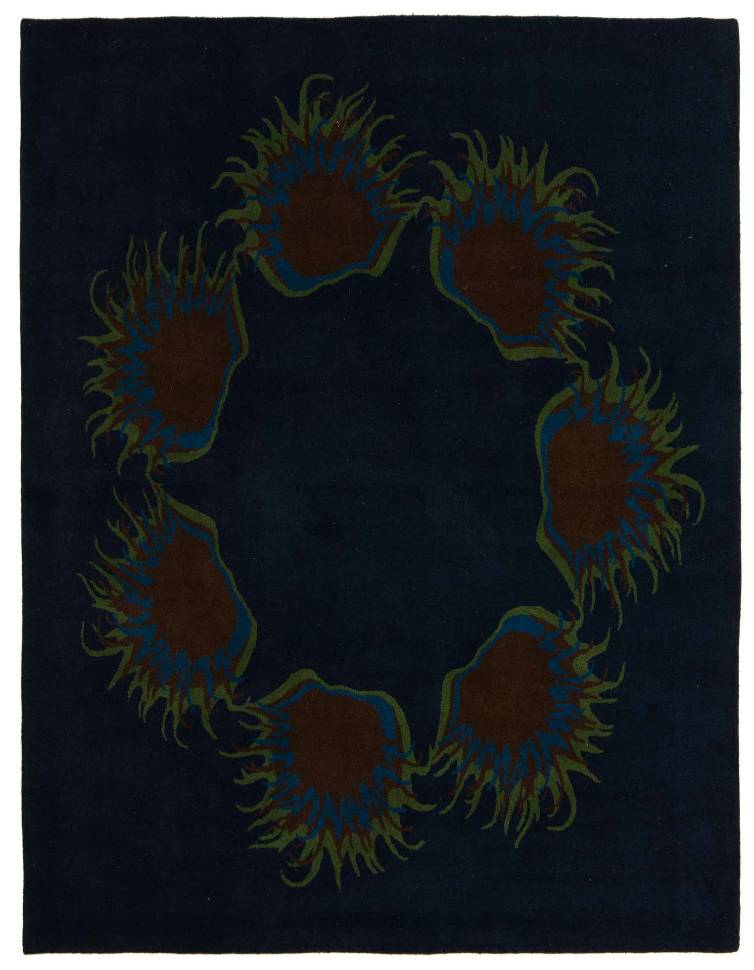 A square navy blue rug with a circular modern pattern of abstract brown, green, and blue shapes resembling sea anemones.
