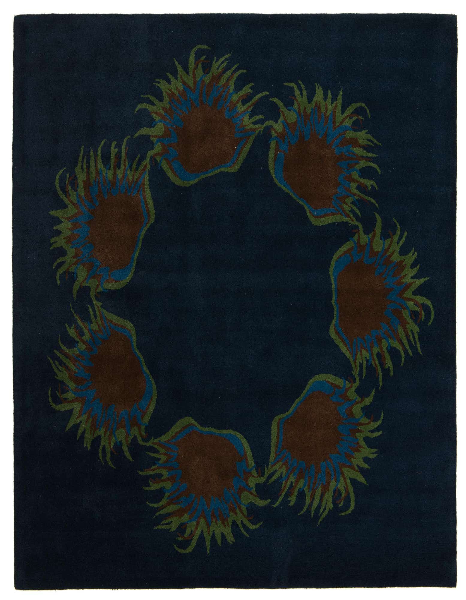 A square navy blue modern area rug with a circular pattern of abstract brown, blue, and green shapes.