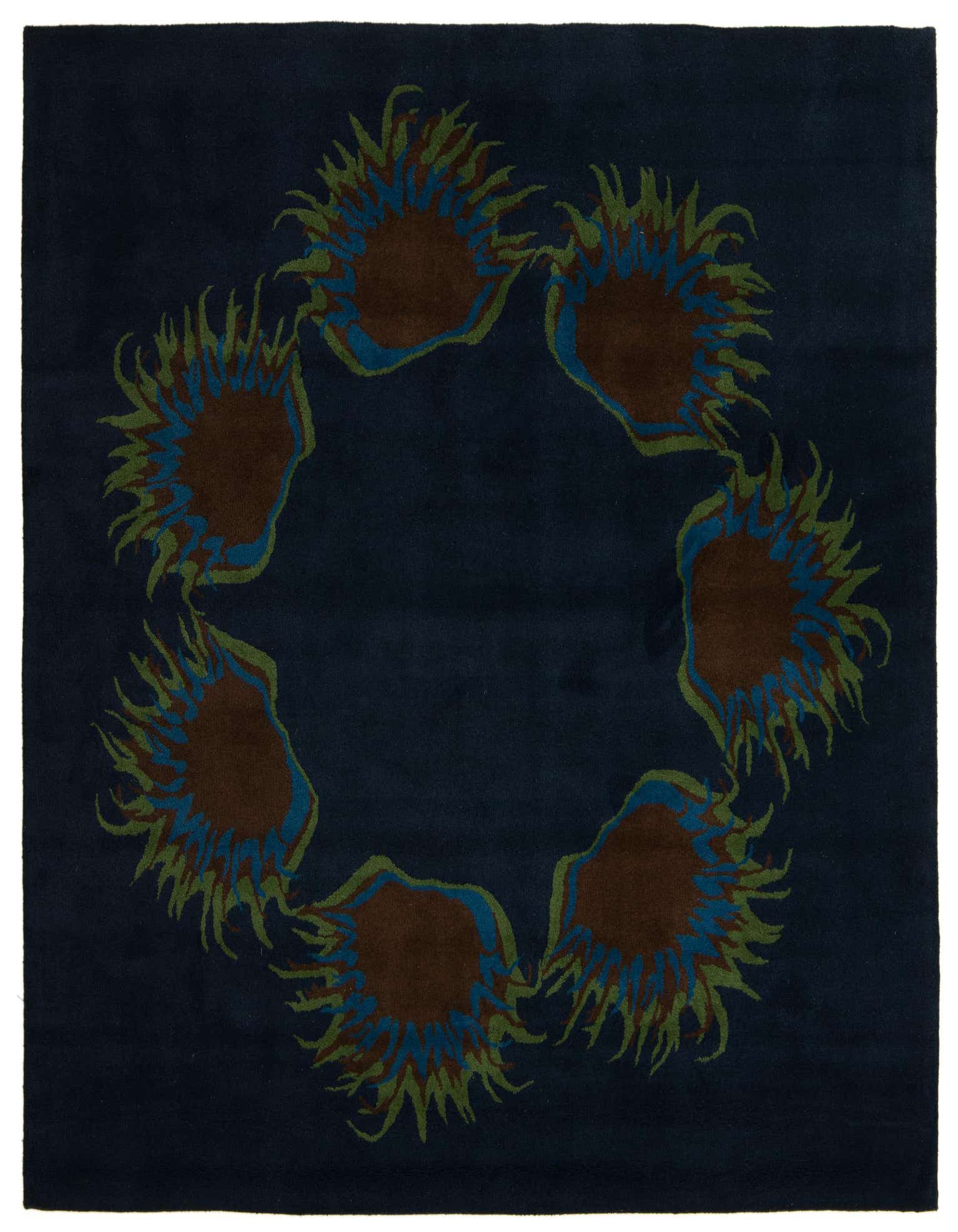 A square navy blue rug with a modern circular pattern of abstract brown, blue, and green shapes.