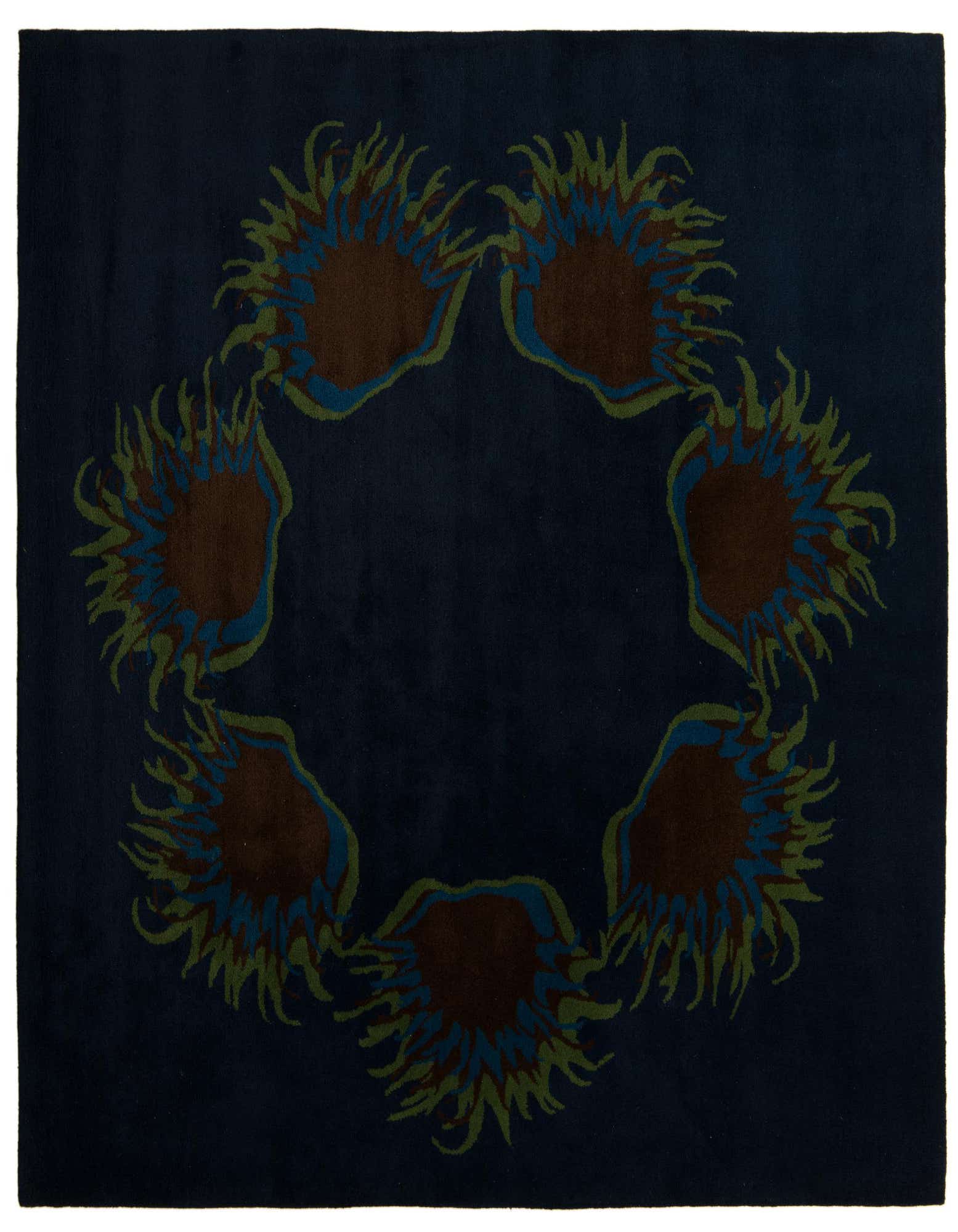A square navy blue rug featuring a modern circular pattern of abstract brown, teal, and olive green shapes.