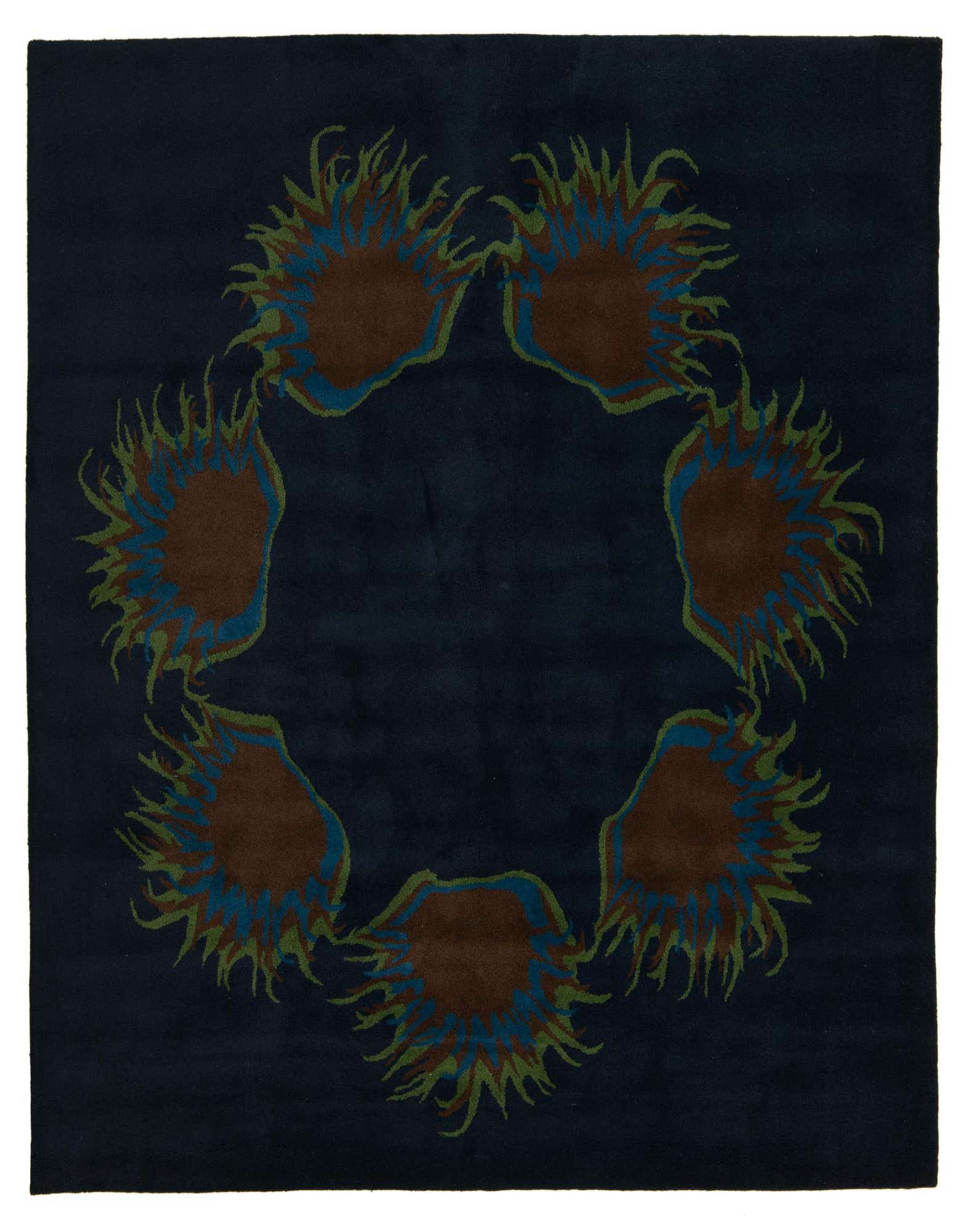 A square navy blue rug with a modern, circular pattern of brown, blue, and green abstract floral shapes.