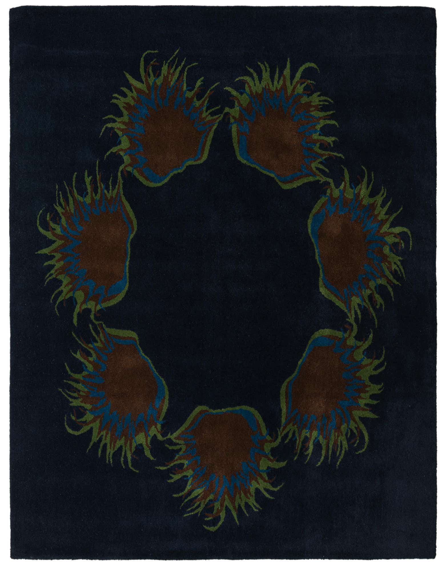 A 7' 6 x 7' 6 square navy blue wool rug featuring a circular floral pattern with brown, blue, and green accents.