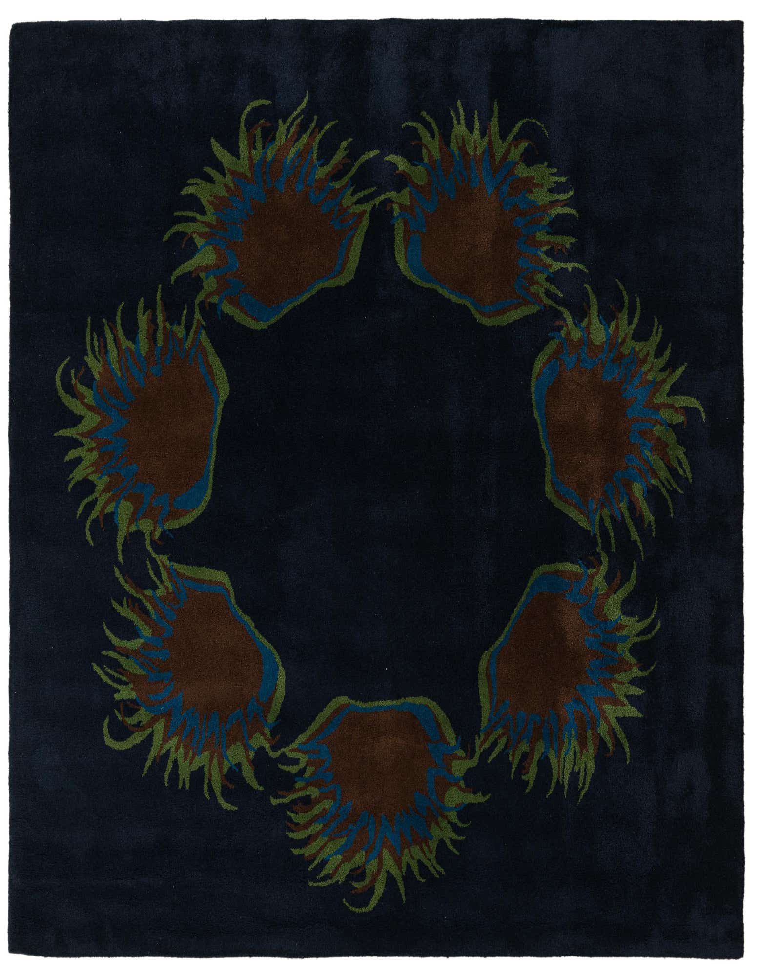 A 7' 6 x 7' 6 square navy blue wool rug featuring a circular floral pattern with brown, blue, and green accents.