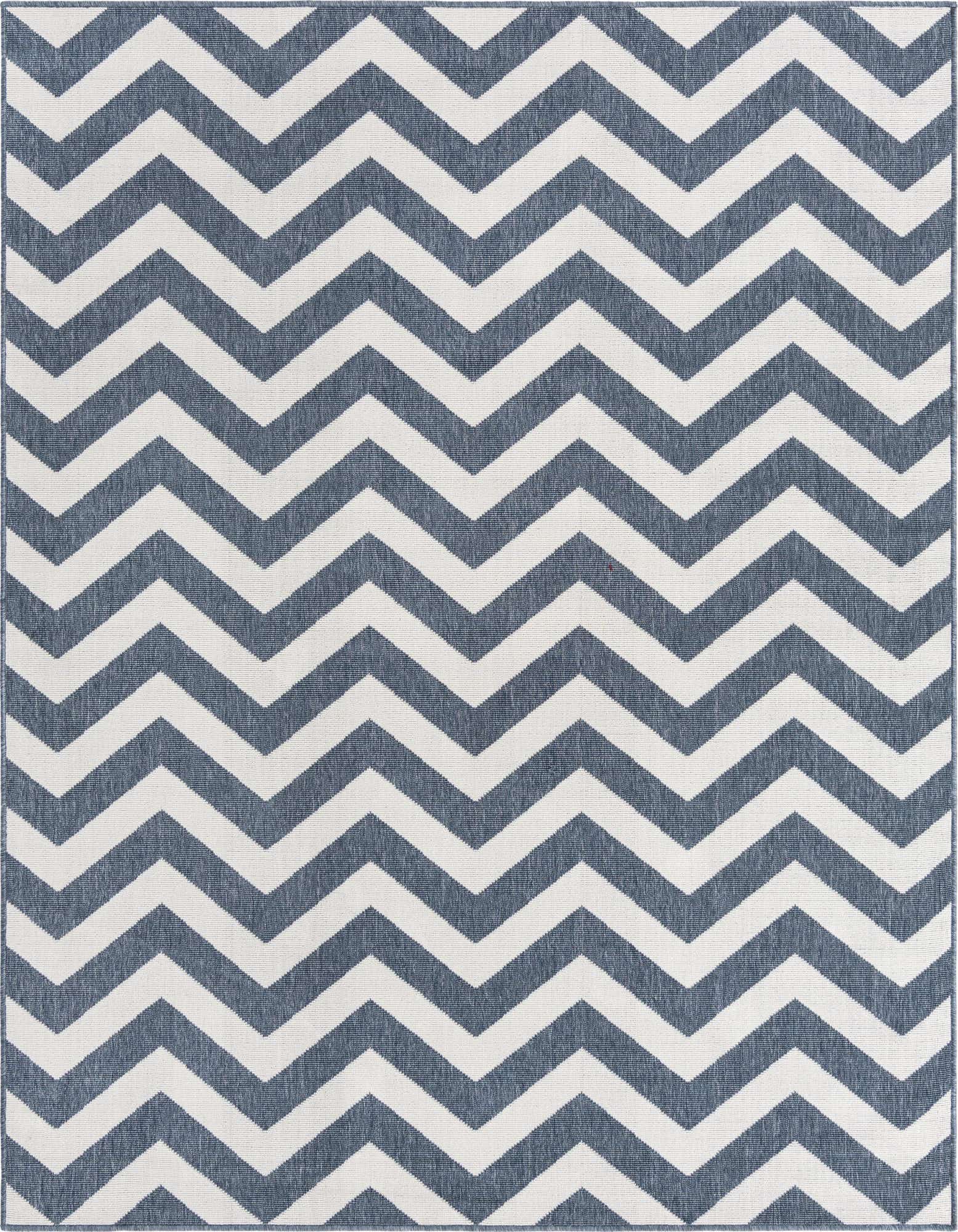 A 7' 10 x 7' 10 square indoor/outdoor rug with a bold navy blue and white chevron pattern, ideal for a patio.